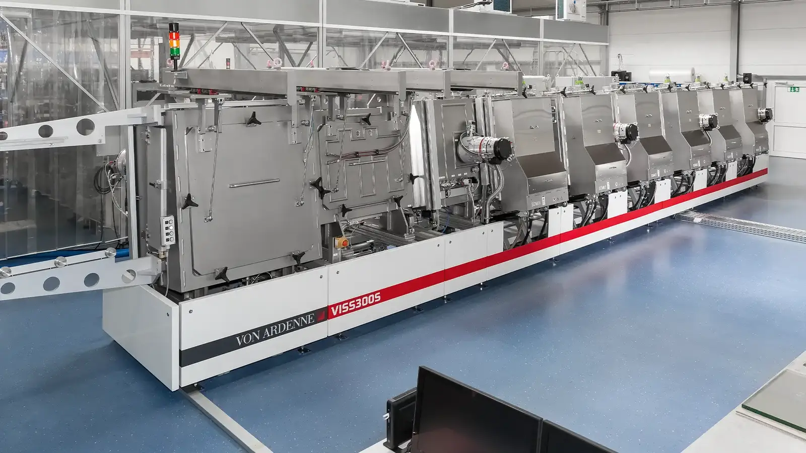 Perspective view of a vertical VON ARDENNE coating system.